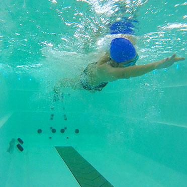 A Typical Swimming Training Scene in a Clear Pool