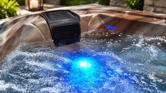 Blue LED lighting glowing softly through the water at the base of the tub