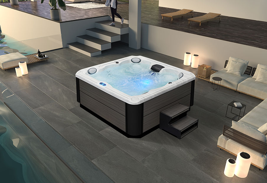 BD-001 spa pool installed on a stone patio with blue LED lighting
