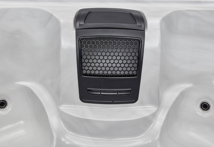 Close-up of the central filtration housing unit with hexagonal grill design