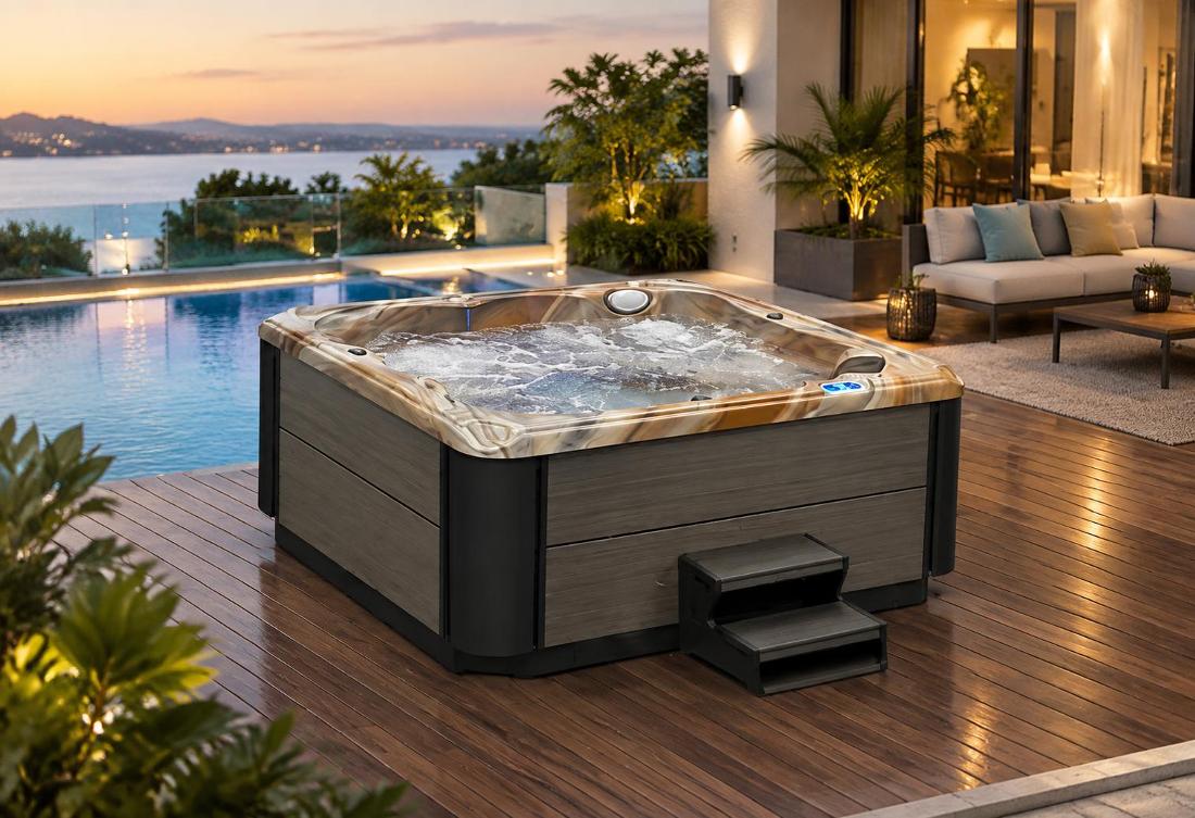A close-up of the water surface inside the hot tub, showing the active bubbling action of the massage jets