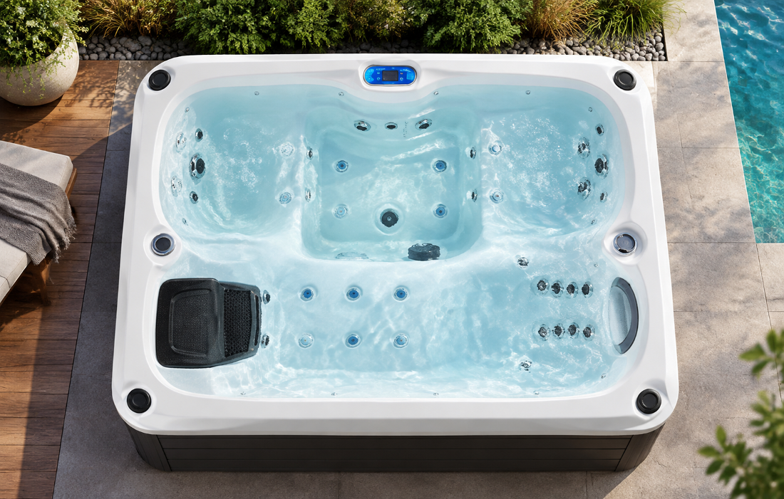 Rectangular hot tub with blue LED lighting on a modern wooden deck at night