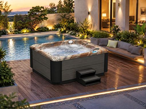BD-004 hot tub installed on a wooden deck in a luxury backyard setting
