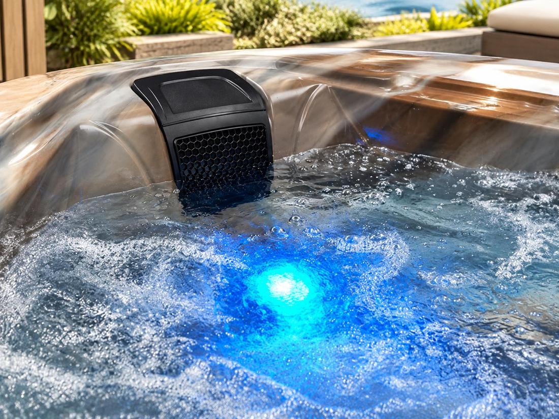 Blue LED lighting glowing through the water at the base of the tub
