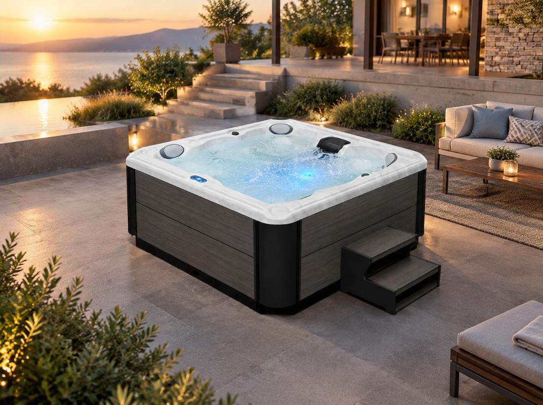 Wide-angle lifestyle shot of the spa in an outdoor deck setting